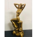 A Carved Figure of a Nude