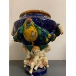 An imposing English majolica jardinière of urn form (probably Royal Doulton/Minton or inspired by