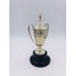 An engraved, hallmarked silver trophy (75g) on stand