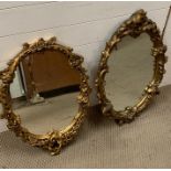 A Pair of plaster framed mirrors