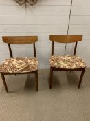 A pair of Mid Century teak dining chairs