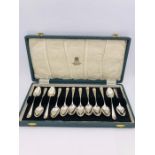 A Boxed set of twelve silver teaspoons, LA makers mark, 1945 Sheffield.