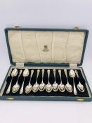 A Boxed set of twelve silver teaspoons, LA makers mark, 1945 Sheffield.