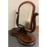 A Mahogany Toilet mirror on kidney shaped base, William IV style.