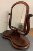 A Mahogany Toilet mirror on kidney shaped base, William IV style.