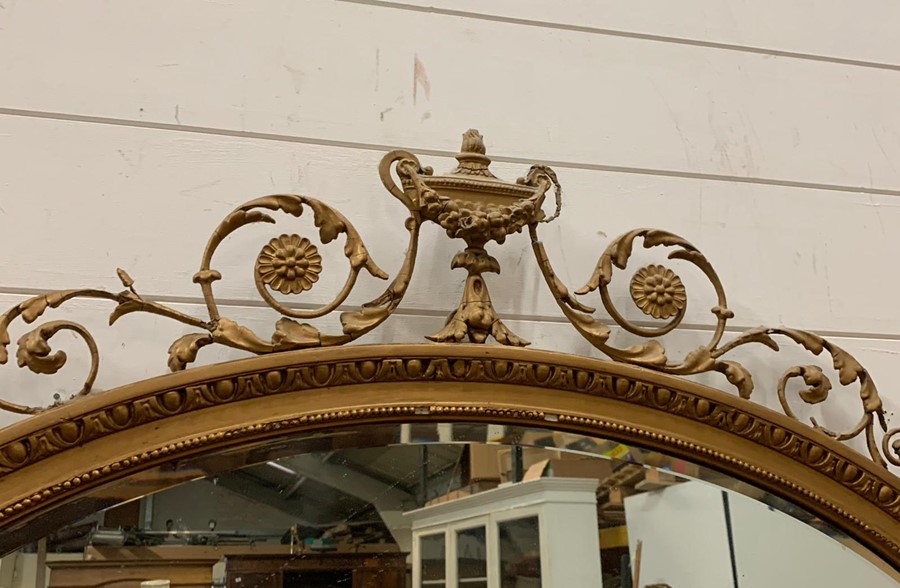 A George IV style giltwood over mantle mirror surmounted by an urn with swags and finials - Image 2 of 3