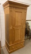 A single door pine wardrobe with drawer under (H193cm W94cm D54cm)