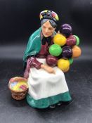 A Royal Doulton figure "The Old Ballon Seller HN1315