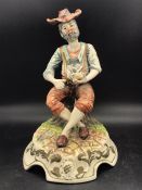 A Capodimonte figure of a country man