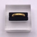 A 22ct gold wedding band (4.2g Total weight)