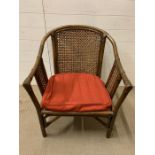 A cane and bamboo style chair