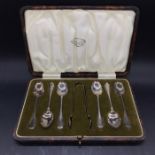 A Cased set of silver six teaspoons and sugar tongs