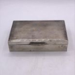 A Hallmarked silver cigarette box, makers mark SJR London Hallmark.