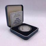 A Royal Mint 90th Birthday Silver Proof Crown