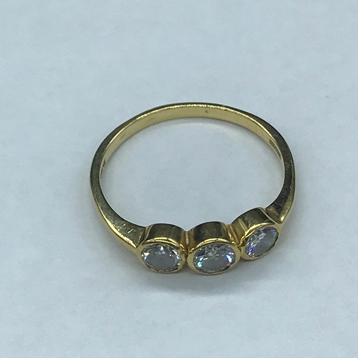 A Three stone diamond ring in 18ct gold ).5Ct Total - Image 3 of 7