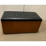 A G-Plan teak blanket box with black button back seat (H48cm W94cm D46cm)