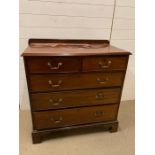 A Two over three mahogany chest of drawers on bracket feet with drop handles (95 cm w x 52 cm d x