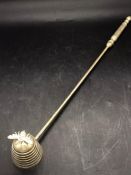 A Kenneth Turner silver plated Bee candle snuffer.