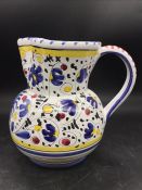 An hand painted vintage Deruta pitcher