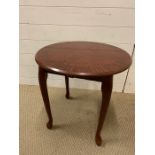 A small circular side table (52cm 52cm)
