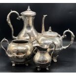 A Silver plated tea service to include tea and coffee pot, along with sugar bowl and milk jug