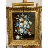 A 20th century English school, Flowers in a blue vase, unsigned, oil on canvas, within an impressive