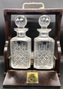 A cased set of decanters