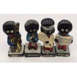 Four vintage Robertson figurines