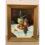 A 20th century Continental school, Still life with carafe of wine with raffia covering, signed lower