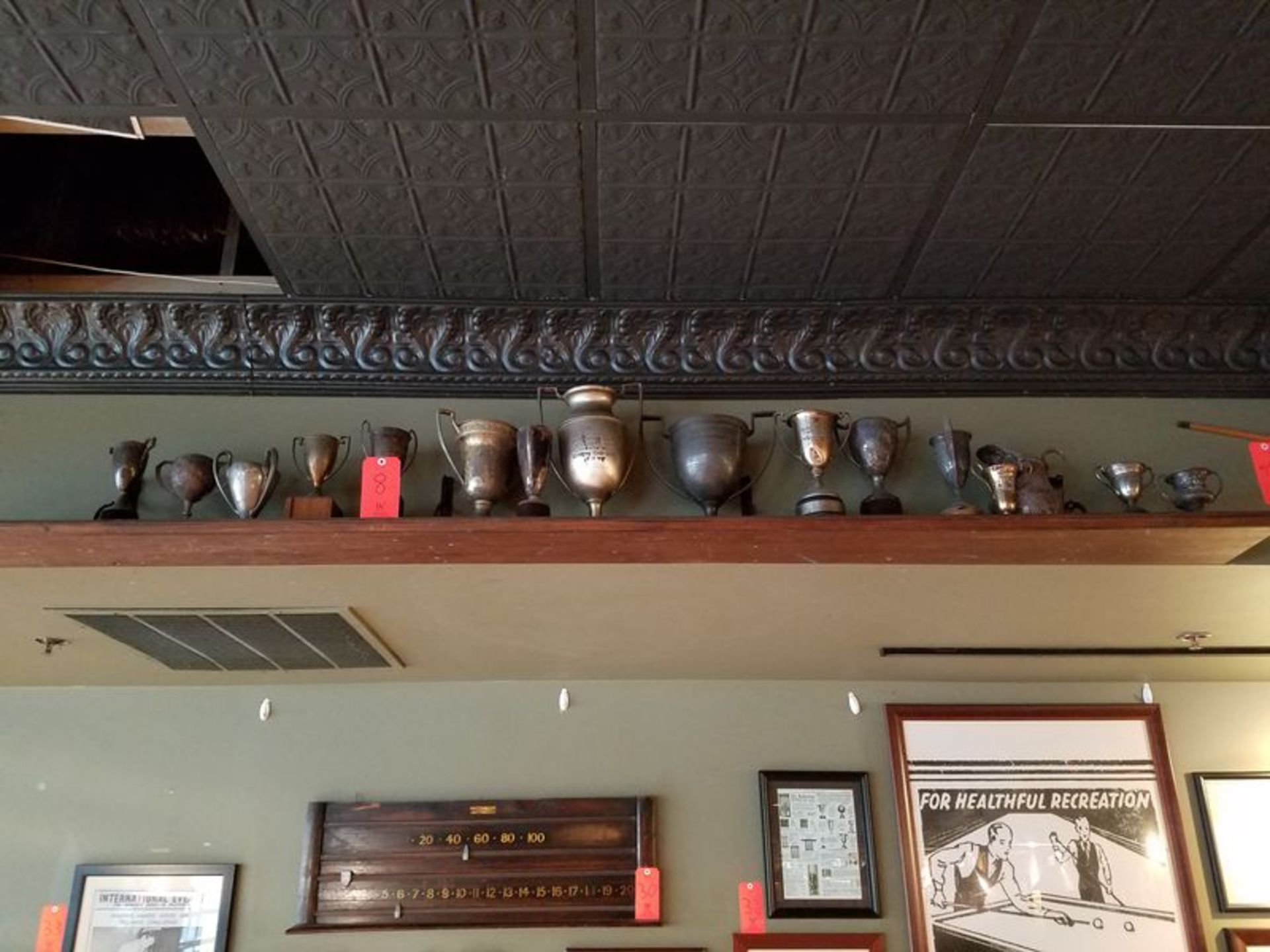 Lot - (16) Trophy's, with Shelf (Wall-Mounted)