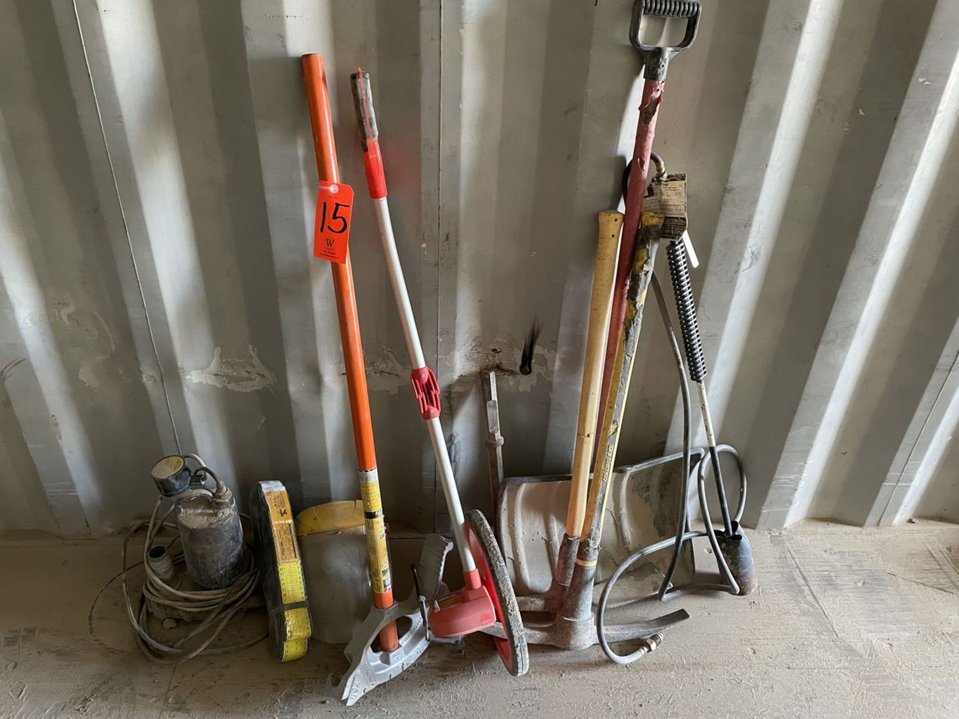 Lot - Assorted Hand Tools, Conduit Bender, Lufkin Measuring Wheel, Picks, Shovels, Etc.