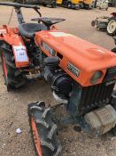 Kubota B7000 E 4 WD Compact Tractor with Rear Mounted Rotavator.