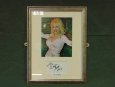 Your Ideal Christmas Present DOLLY PARTON signed picture Dated 1993 with Certificate of Authenticity