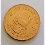 A 1977 Krugerrand 1 oz (33.93g) gold coin, 32.77mm