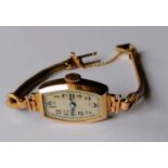 A mid-20th century ladies dress watch with 9ct gold case and strap, Swiss mechanism, stamped