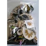 An assortment of mixed costume jewellery, etc