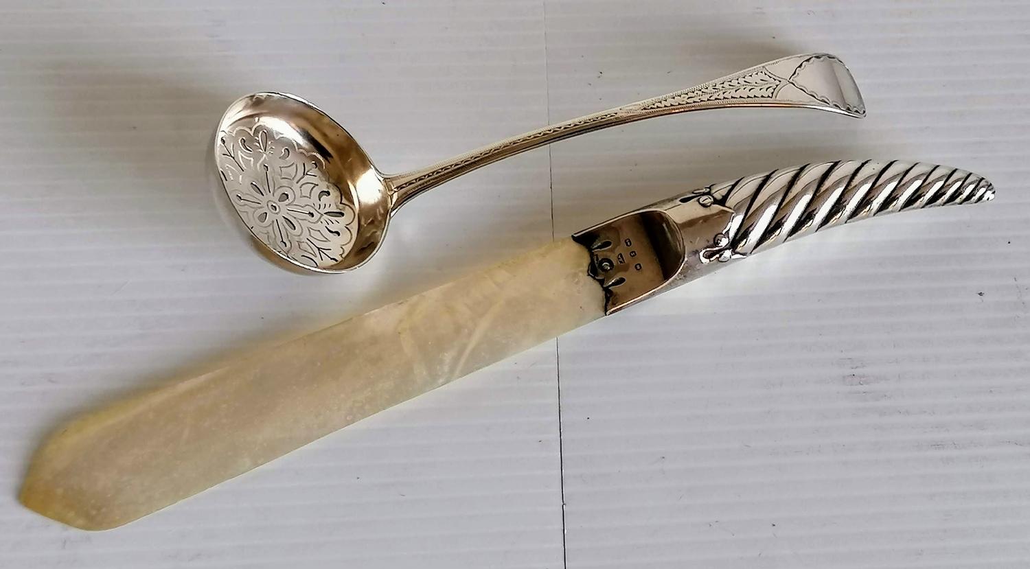 A George III silver straining spoon with bright-cut decoration by Sarah & John William Blake,