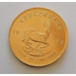 A 1981 Krugerrand 1 oz (33.93g) gold coin, 32.77mm