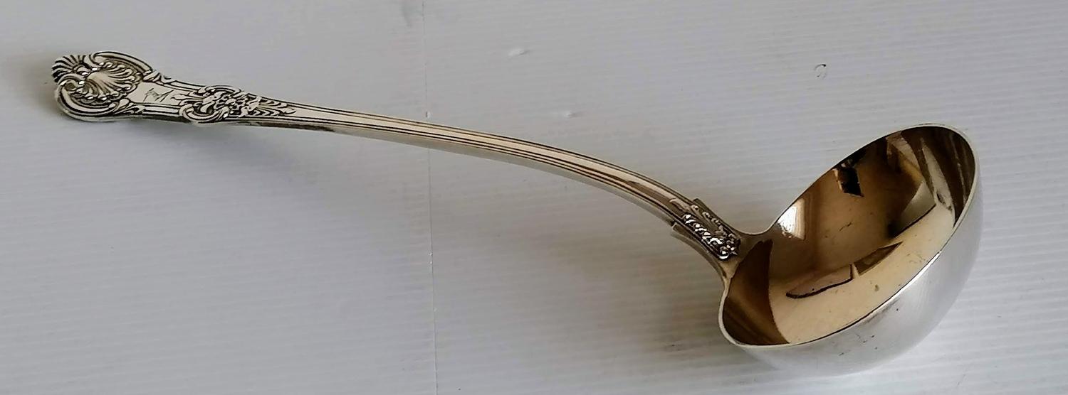 A Victorian silver soup ladle in King's pattern, crested, by Chawner & Co., London, 1848, 34 cm,