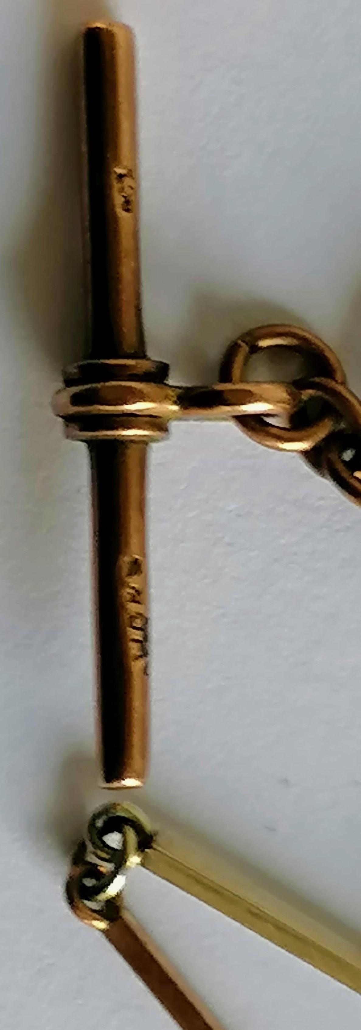 A 9ct yellow and white gold Albert chain, stamped to t-bar and clasp, possible by William - Image 2 of 2