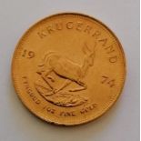 A 1974 Krugerrand 1 oz (33.93g) gold coin, 32.77mm