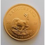 A 2018 Krugerrand 1 oz (33.93g) gold coin, 32.77mm