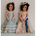 Two Jumeau bisque head dolls stamped Jumeau 1938 Paris, with composition bodies to commemorate the