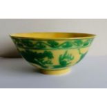A green and yellow-glazed dragon bowl, incised and painted with a pair of five-claw dragons