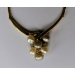 A 14ct yellow gold pearl and diamond pendant (20mm x 15mm) necklace, 47 cm, stamped 585, 13g