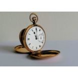 A Dennison full-hunter 9ct gold pocket watch with Roman numerals, subsidiary seconds hand, stem-