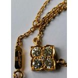 A Cartier 18ct yellow gold and diamond quatrefoil pendant set with five brilliant-cut diamonds,