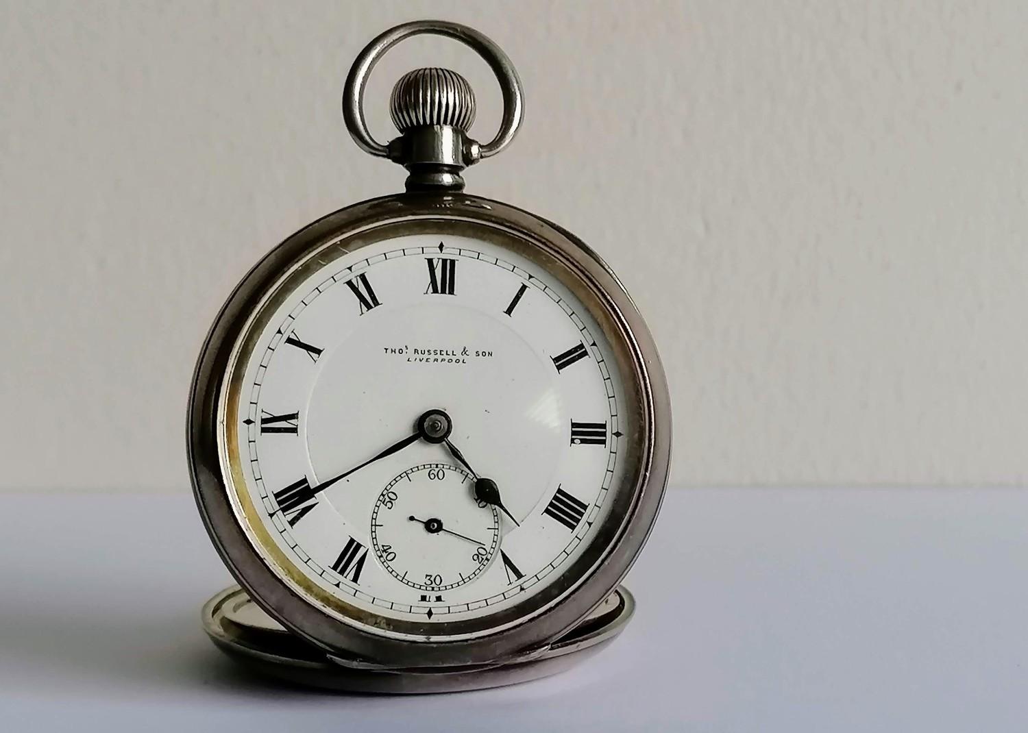 An early 20th century silver half-hunter pocket watch by Thos Russell, Liverpool, Swiss mechanism,