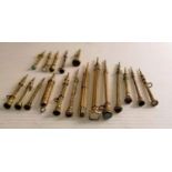 A selection of eighteen Edwardian gilt metal propelling pencils with etched floral decoration,