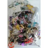 A large selection of mixed costume jewellery, etc